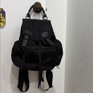 Steve Madden women’s black backpack drawstring closure zipper outside pockets